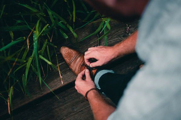 footwear-close-up-man-tying-shoelace.jpg